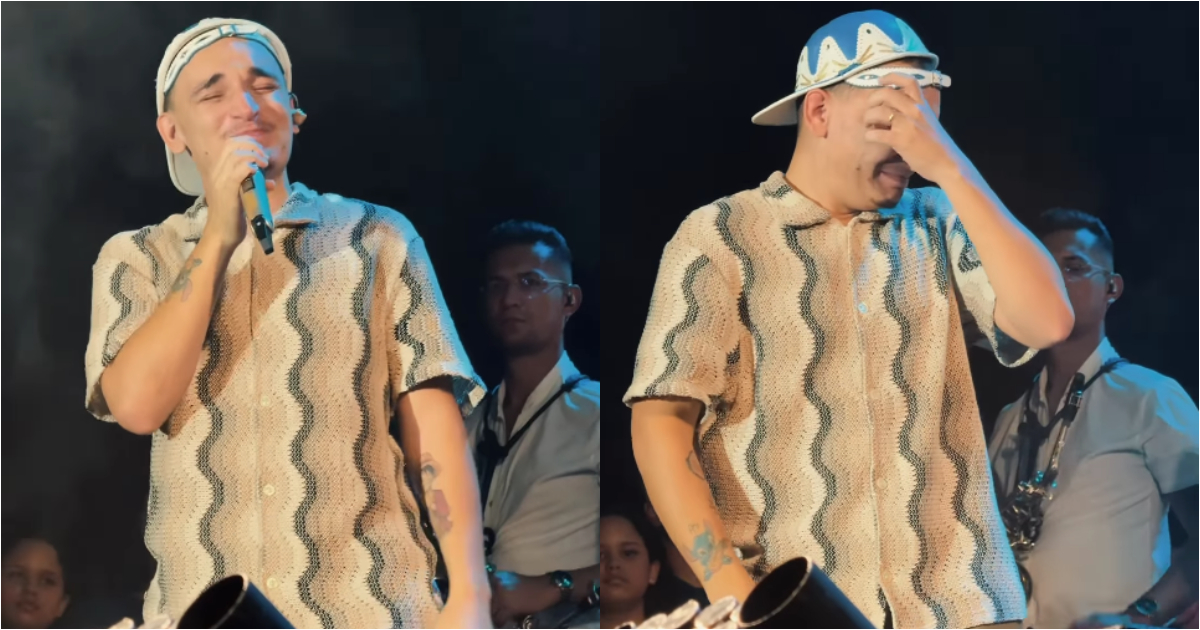 joão gomes se emocionando no palco