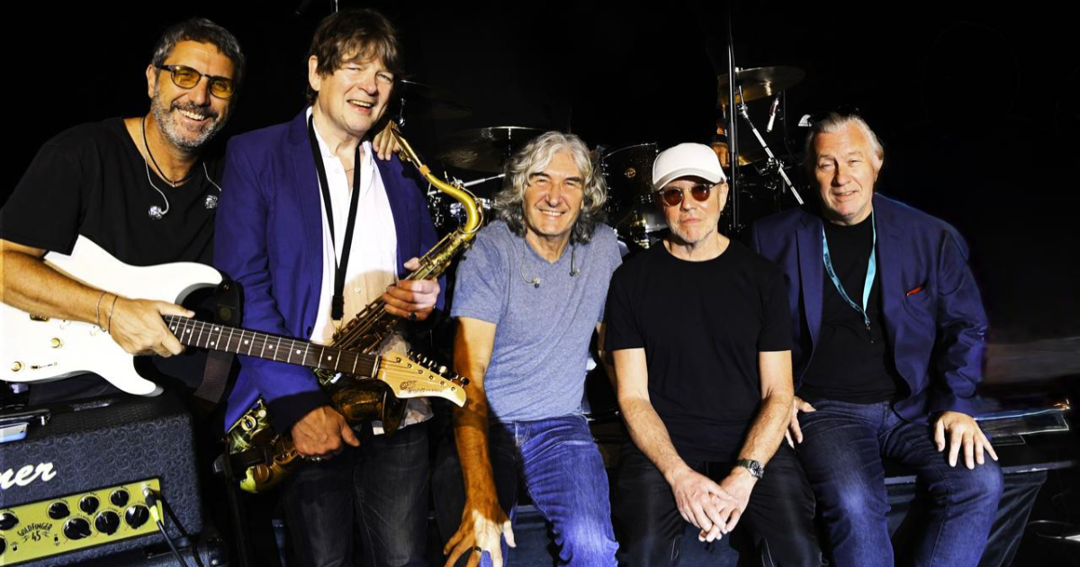 dire straits legacy posando