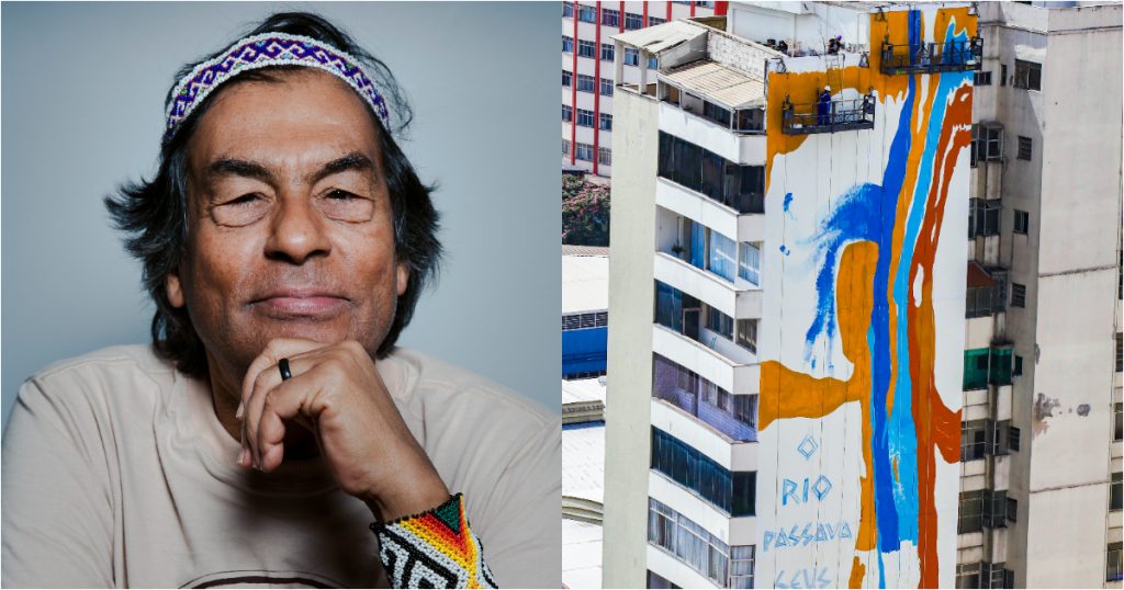 ailton krenak posando com o queixo apoiado na mão e empena de edifício em bh sendo pintada