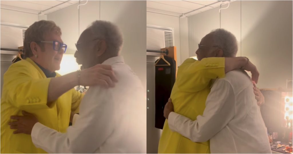 elton john e gilberto gil se abraçando nos bastidores do rock in rio