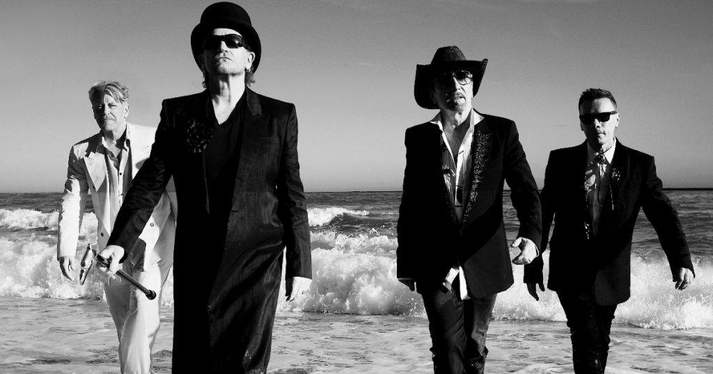 banda u2 em ensaio fotográfico na praia